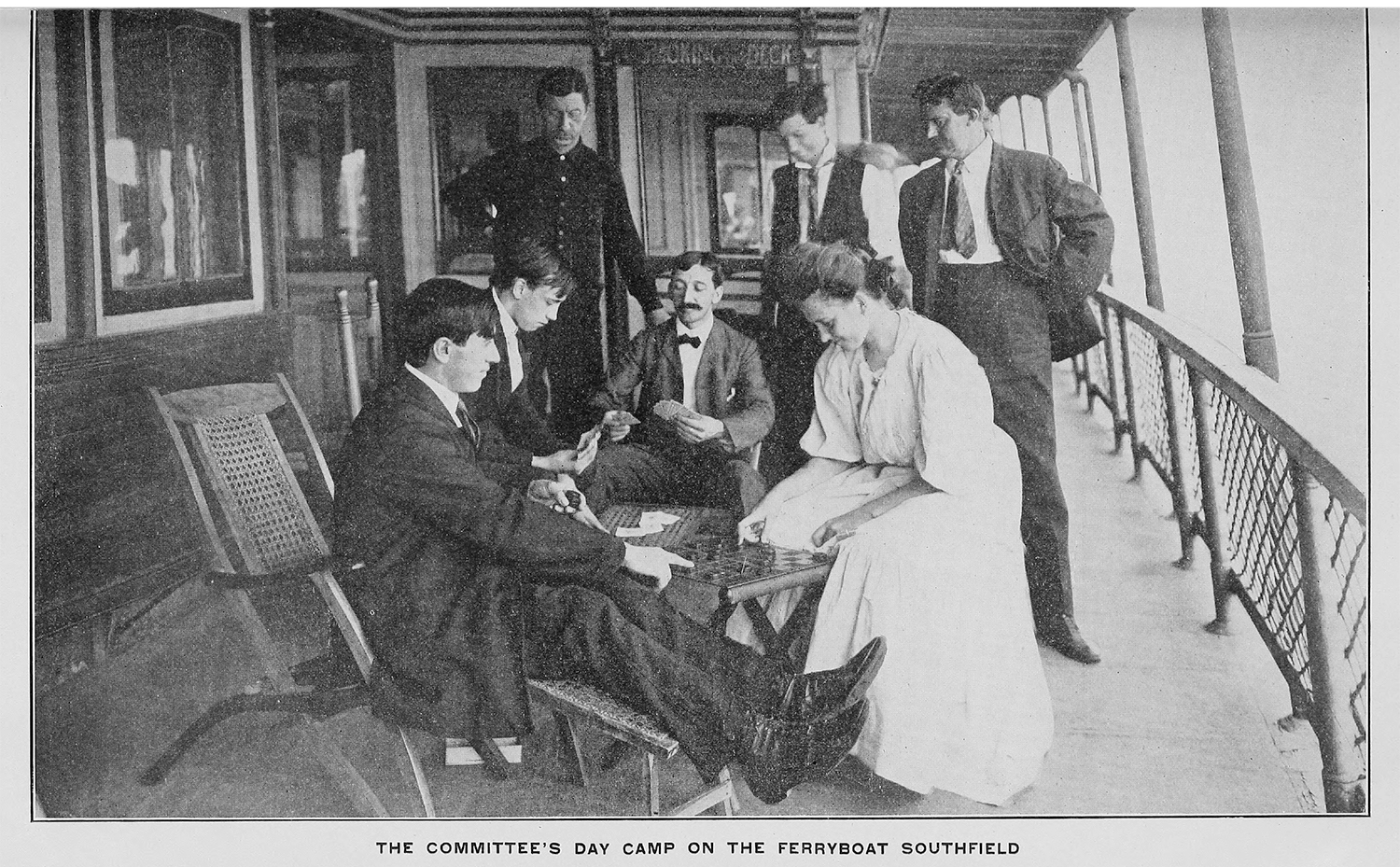 A group of adults play board and card games.