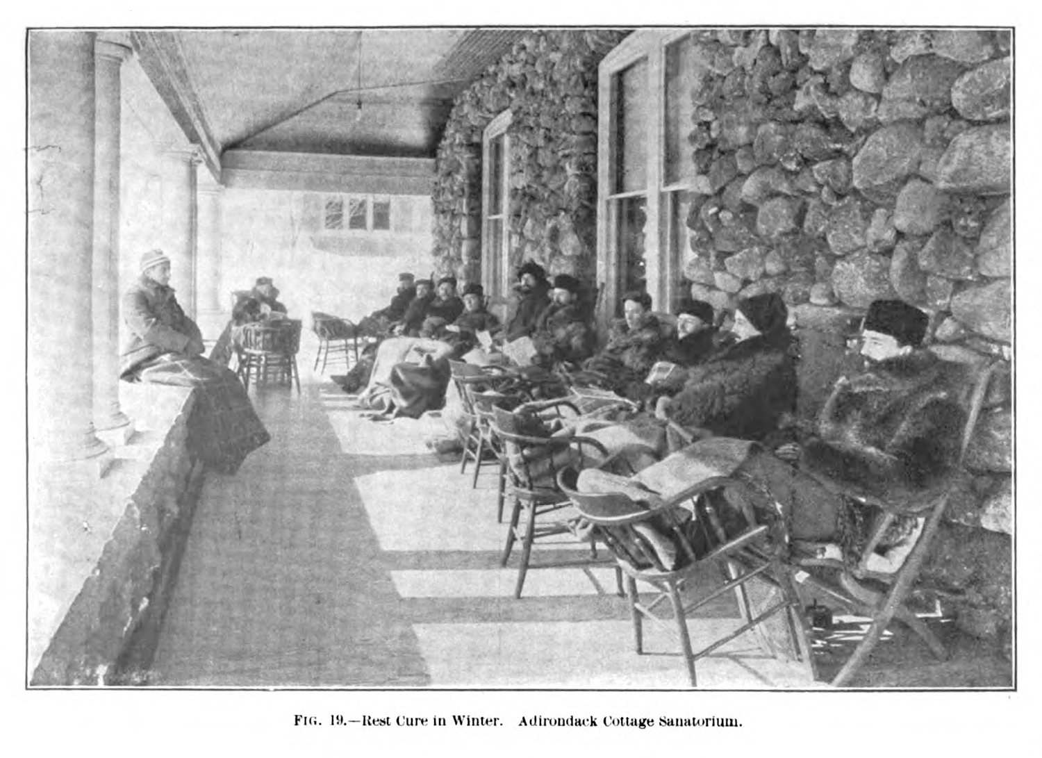 Patients gathered on a poach at the Adirondack Cottage Sanatorium.