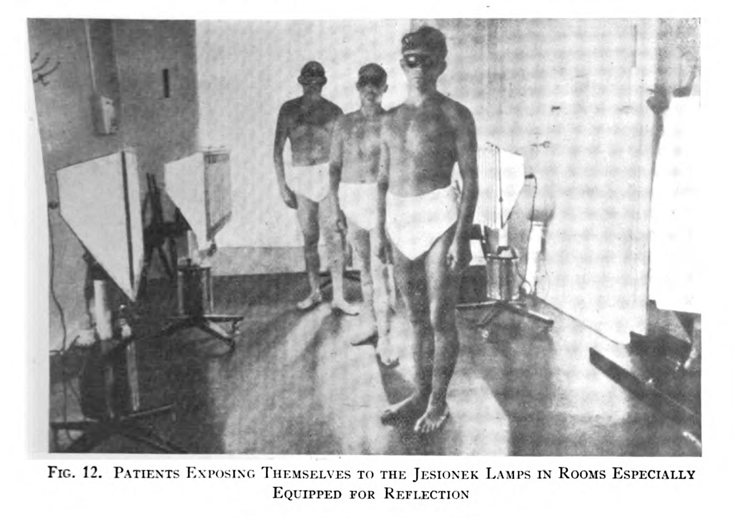 An example of phototherapy. Semi-nude patients in goggles stare directly at the camera.